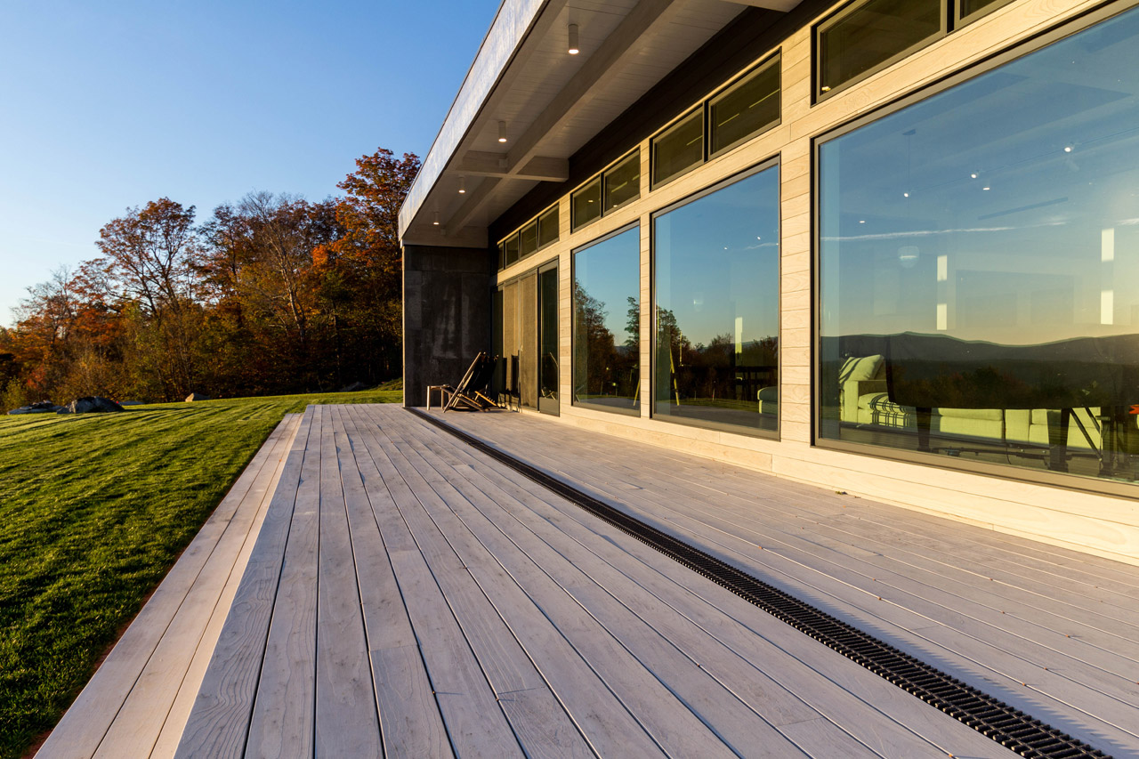 Accoya wood exterior siding and decking on a modern residence