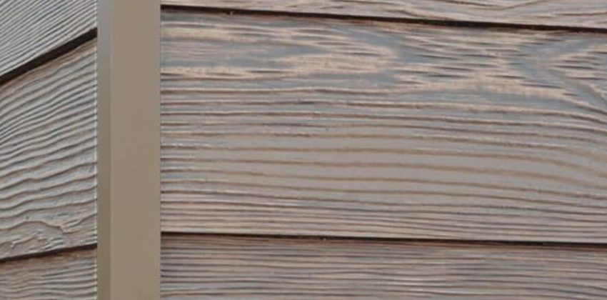 Caribou Trails RusticSeries wood-look composite siding on James Hardie fiber cement lap siding