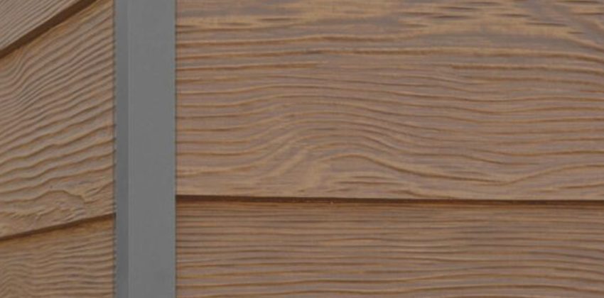 Winchester Brown RusticSeries wood-look composite siding on James Hardie fiber cement lap siding